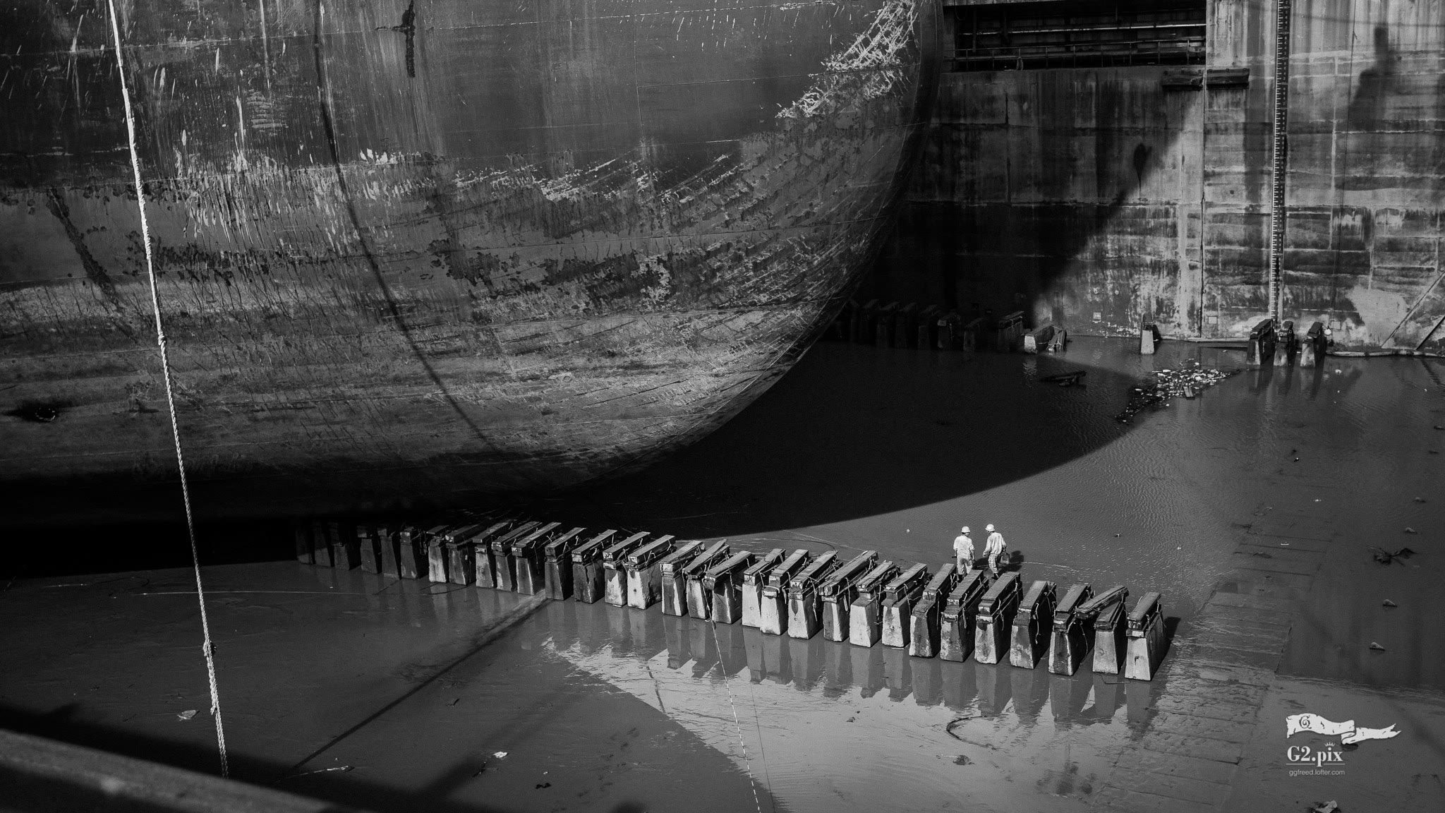 A giant oil tanker in a dry dock