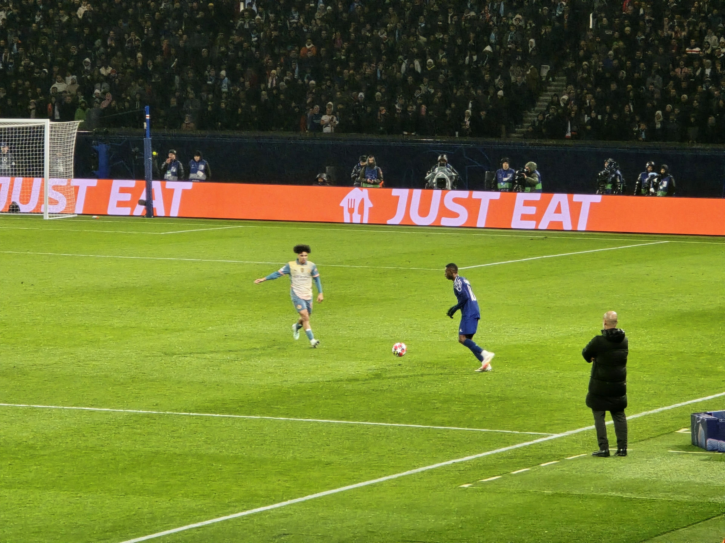 Guardiola on the touchline during a Manchester City match in Paris