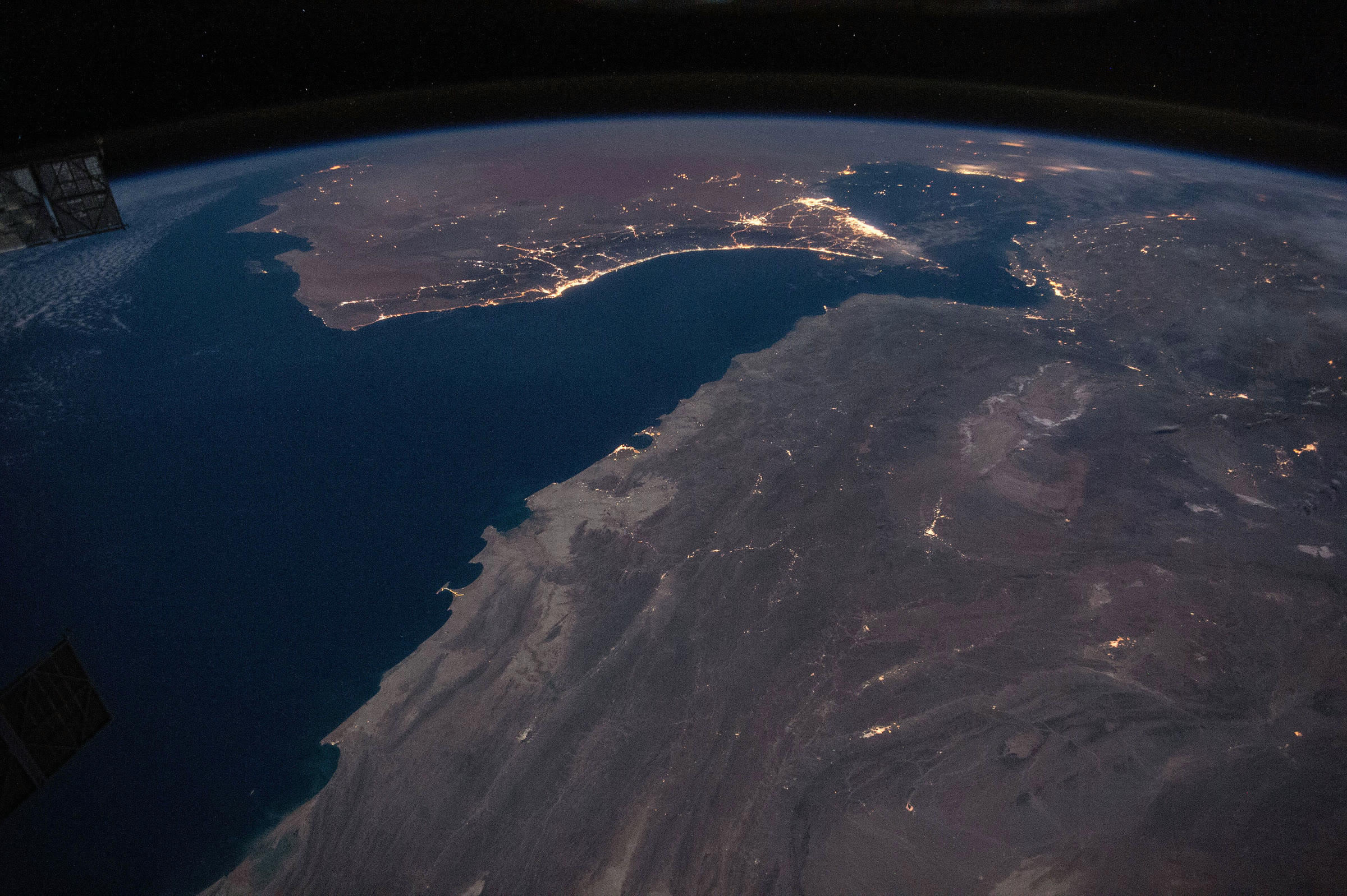 The Gulf of Oman and the Strait of Hormuz at night, seen from the International Space Station